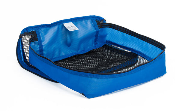 An empty and open Island (blue) Aether Large Aeronaut 30 Packing Cube.